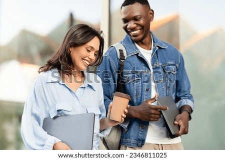 Similar – Image, Stock Photo Multiracial couple in the park