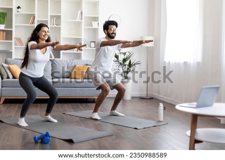 Similar – Image, Stock Photo Male making yoga exercise near window