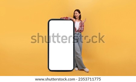 Similar – Image, Stock Photo Young Asian ladies showing V sign and smiling while lying on grass in sunlight