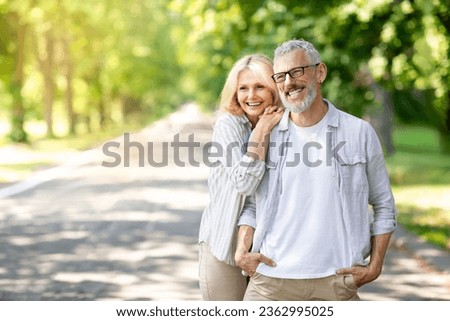 Similar – Image, Stock Photo Senior couple hugging outdoors in autumn