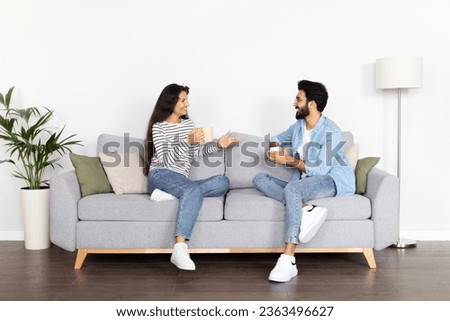 Similar – Image, Stock Photo Family sitting in coffee shop at store front in the city center, wearing the face mask to avoid virus infection