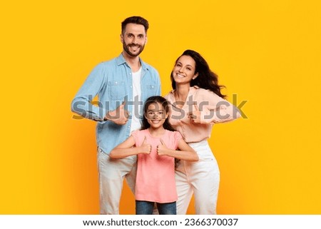 Similar – Image, Stock Photo Man showing child something on horizon during boat ride