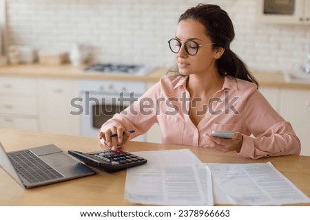 Similar – Image, Stock Photo Young adult female professional working in a modern office