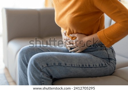 Similar – Image, Stock Photo Woman worried while showing off the window in the city during a spring day, mental health concept