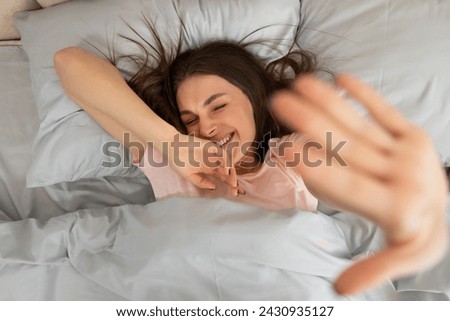 Similar – Image, Stock Photo Close-up of a woman with braids using the mobile