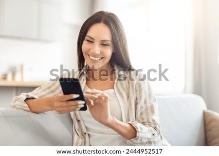 Similar – Image, Stock Photo Cheerful woman surfing in sea