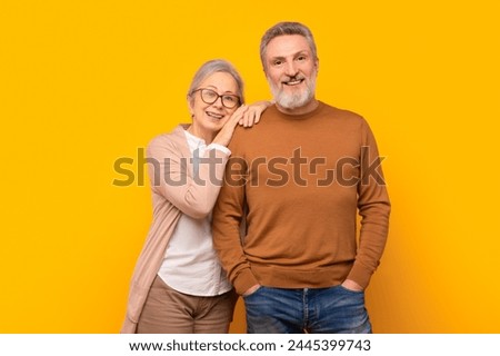 Similar – Image, Stock Photo Elderly couple embracing in autumn park
