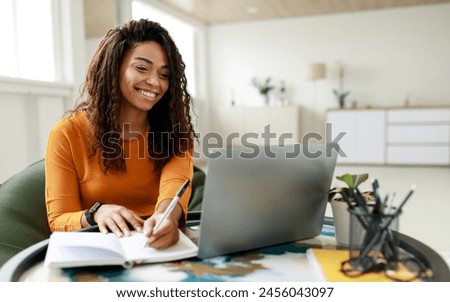 Similar – Image, Stock Photo Black woman smiling sitting on the sand at the beach