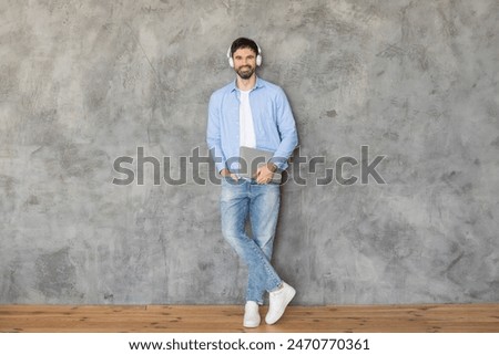 Similar – Image, Stock Photo Man stands on wooden bridge over river