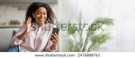 Similar – Image, Stock Photo Calling someone. Like this gorgeous girl dressed in a shiny dress. At the hotel. While getting comfy in white sheets.