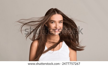 Image, Stock Photo Long haired woman standing on railways overgrown with dry grass