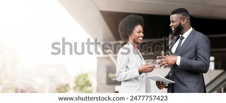 Similar – Image, Stock Photo Handsome Black Man with Earphones Posing on Big City Street