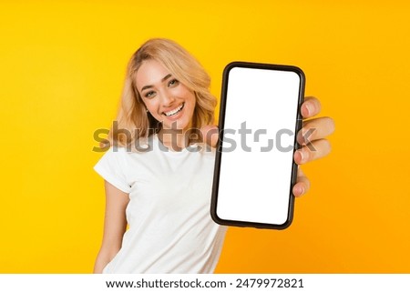 Image, Stock Photo Young woman holding yellow reusable bottle