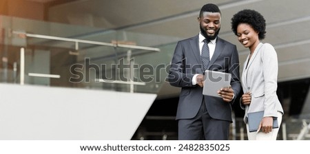 Similar – Image, Stock Photo Cheerful businesswoman browsing tablet in office