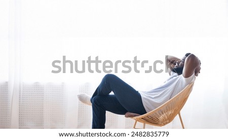 Similar – Image, Stock Photo Relaxed man chilling in swimming pool in resort