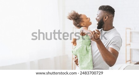 Similar – Image, Stock Photo Children playing with their toys on a wooden floor