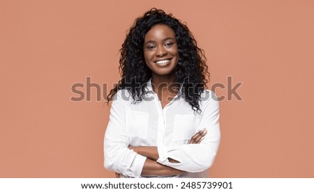 Similar – Image, Stock Photo Beautiful woman with peach standing in modern kitchen