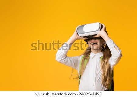 Similar – Image, Stock Photo Child in VR headset playing on couch