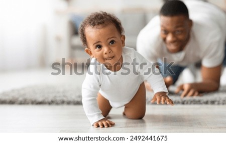 Similar – Image, Stock Photo Young black man enjoying music in headphones