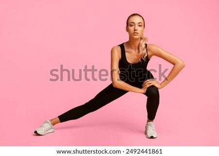 Similar – Image, Stock Photo Flexible woman doing side bend and practicing yoga