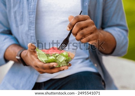 Similar – Image, Stock Photo Crop man with bowl of ramen soup