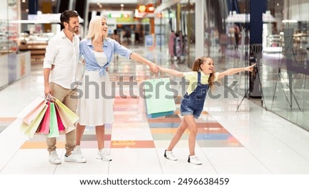 Similar – Image, Stock Photo Man showing child something on horizon during boat ride