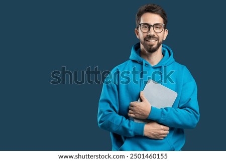 Similar – Image, Stock Photo A young man is standing alone in the landscape, but the sky is cloudy. Anyway.