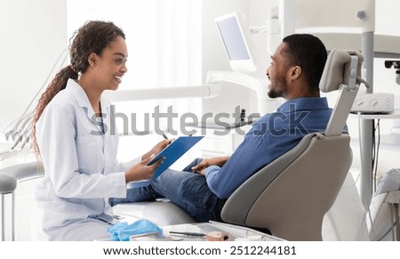 Similar – Image, Stock Photo Smiling black man in rings speaking on smartphone