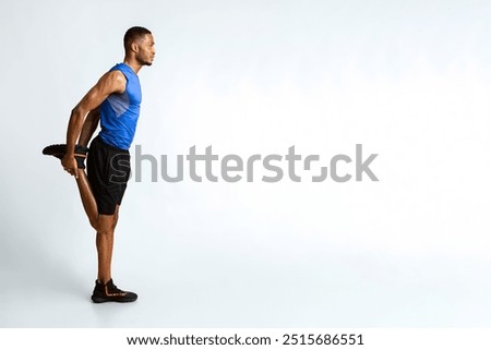 Similar – Image, Stock Photo Black serious sportive man using smartphone during workout