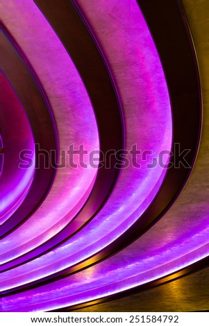 Abstract vertical background - dark purple lines on the ceiling