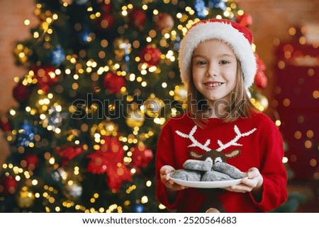 Similar – Image, Stock Photo Chocolate Santa Claus looks out of a white paper bag with starlight