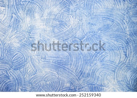Decorative blue plaster texture on the wall - art brush stroke background