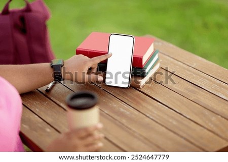 Similar – Foto Bild Bücherstapel mit einer Tasse Kaffee und einem Muffin auf einer weißen Bettdecke im Schlafzimmer