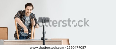 Similar – Image, Stock Photo Repairman with headphones in workshop