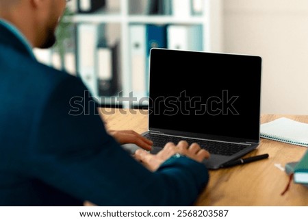 Similar – Image, Stock Photo Unrecognizable employee using professional tools for book making