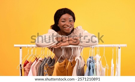 Similar – Image, Stock Photo Cheerful black woman leaning on railing in port