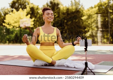 Similar – Image, Stock Photo Content young black lady reading notes while lying on bed