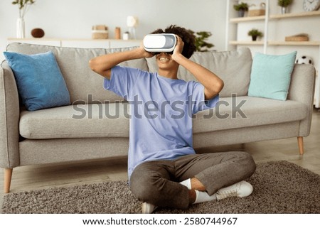 Similar – Image, Stock Photo Boy exploring cyberspace in VR glasses