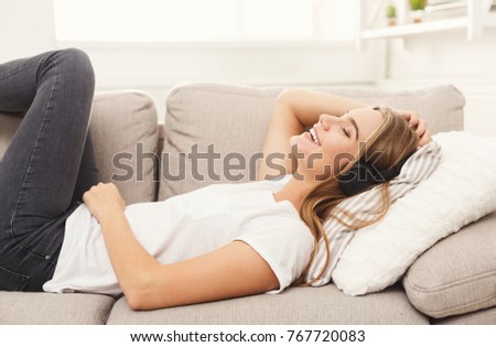 Similar – Image, Stock Photo Lying smiling woman with petals on face