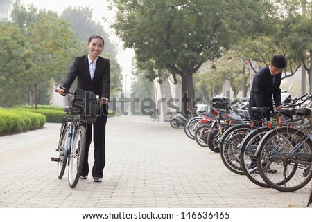Young Business people parking their bikes in Beijing