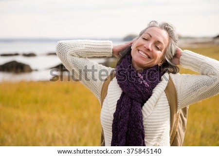 Similar – Image, Stock Photo Content woman with USA flag standing on road