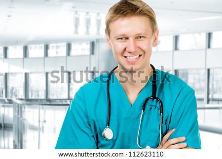 portrait of a medical doctor posing on the clinic background