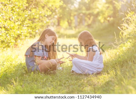 Similar – Image, Stock Photo Two little girls gardening in urban community garden