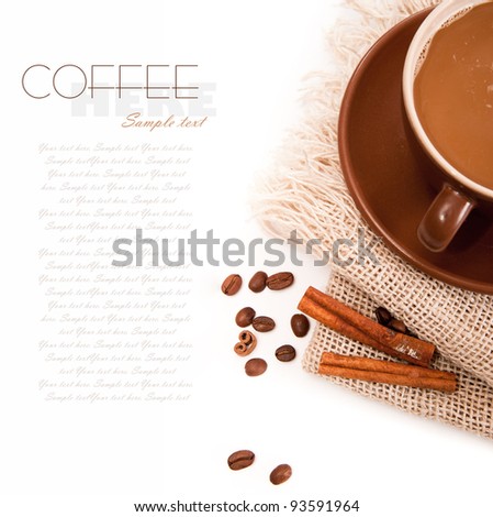 Ceramic cup of coffee with cinnamon on white