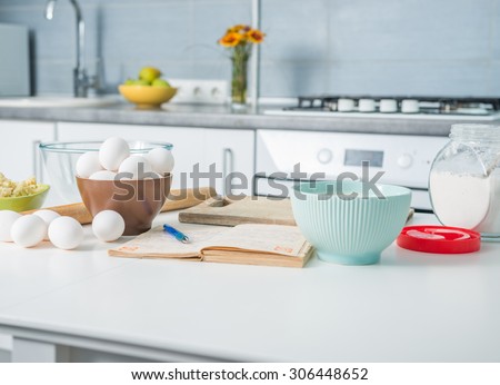 Similar – Image, Stock Photo flour in a bowl and an egg on a white kitchen table