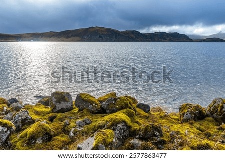 Similar – Image, Stock Photo Large geyser on Iceland surrounded by lava cliffs