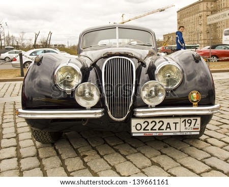 MOSCOW - APRIL 21: Retro Jaguar car model on rally of classical cars on Poklonnaya hill,  April 21, 2013, in  Moscow, Russia.