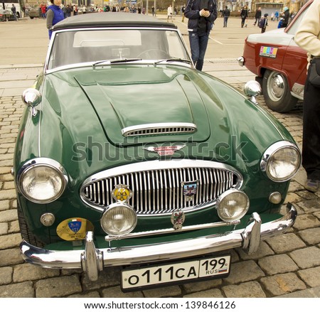 MOSCOW - APRIL 21: retro car Austin Healey on rally of classical cars on Poklonnaya hill,  April 21, 2013, in town Moscow, Russia, unidentified people looking at rally.