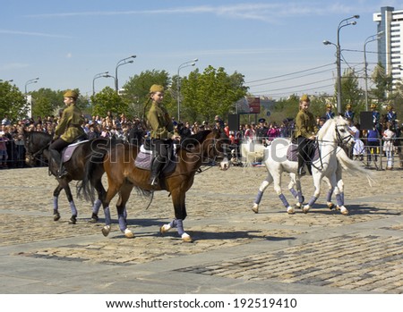 MOSCOW - MAY 9, 2014: cavalry show in memorial  Poklonnaya hill devoted to holiday Victory day of victory in Second World War, participants President cavalry regiment and Kremlin cavalry school.