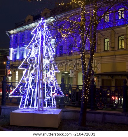 MOSCOW - DECEMBER 31, 2013: electric Christmas tree - street decoration on Tsvetnoy boulevard.